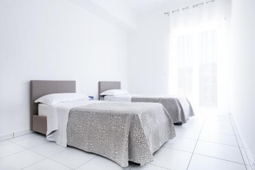 Vuelle Residence Apartments Capo dʼOrlando Buitenkant foto