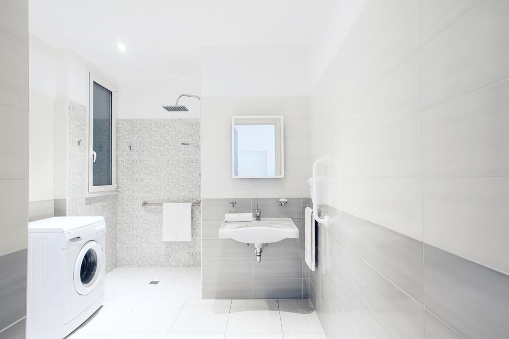 Vuelle Residence Apartments Capo dʼOrlando Kamer foto
