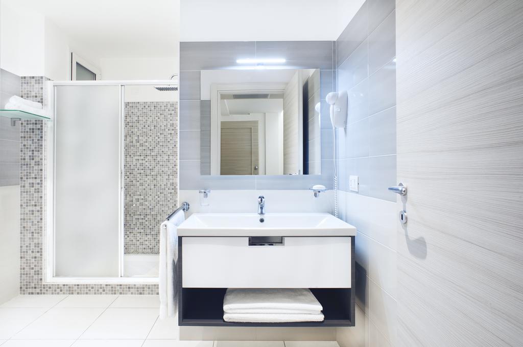Vuelle Residence Apartments Capo dʼOrlando Kamer foto