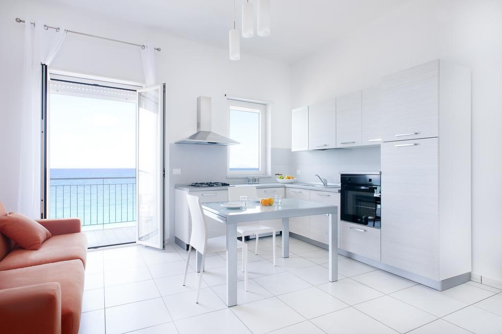 Vuelle Residence Apartments Capo dʼOrlando Kamer foto